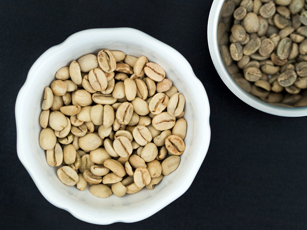 The pale-coloured Monsooned Malabar arabica, compared with green Yirgachefe beans from Ethiopia. /  Photo Source
