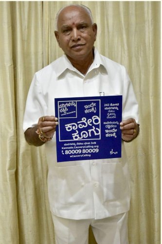 Chief Minister B S Yediyurappa releases the handbill on ‘Cauvery Koogu’ campaign.