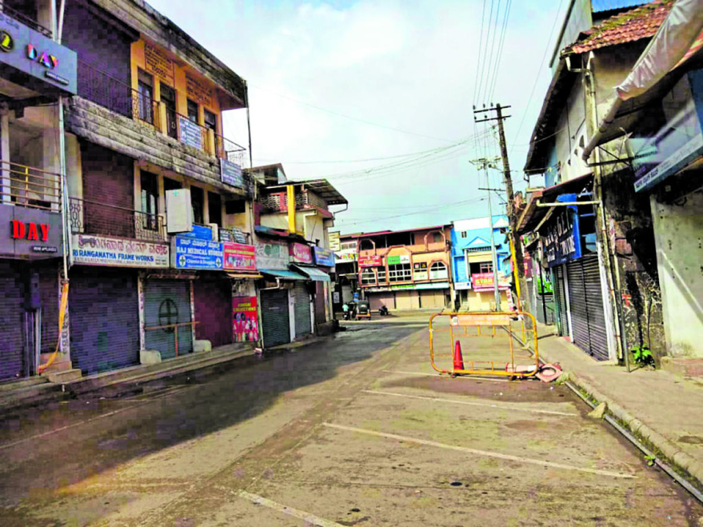 College Road in Madikeri wore a deserted look following the voluntary lockdown after 2 pm. 